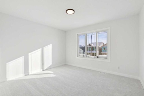 571 Buffaloberry Manor Se, Calgary, AB - Indoor Photo Showing Other Room