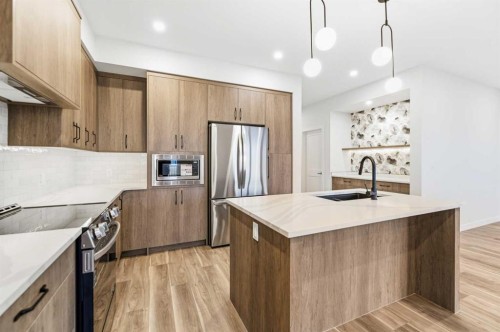 14 Vista Close, Blackfalds, AB - Indoor Photo Showing Kitchen With Upgraded Kitchen