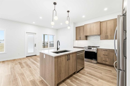 14 Vista Close, Blackfalds, AB - Indoor Photo Showing Kitchen With Double Sink With Upgraded Kitchen