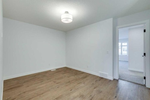 77 Savanna Place Ne, Calgary, AB - Indoor Photo Showing Other Room