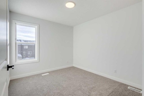 77 Savanna Place Ne, Calgary, AB - Indoor Photo Showing Other Room