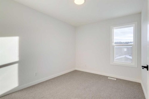 77 Savanna Place Ne, Calgary, AB - Indoor Photo Showing Other Room