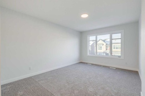 77 Savanna Place Ne, Calgary, AB - Indoor Photo Showing Other Room