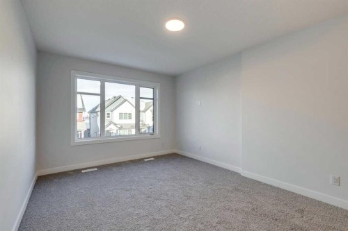 77 Savanna Place Ne, Calgary, AB - Indoor Photo Showing Other Room