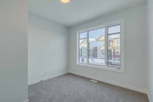 77 Savanna Place Ne, Calgary, AB - Indoor Photo Showing Other Room