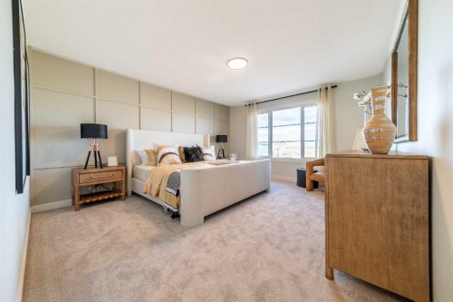 405 Sora Way Se, Calgary, AB - Indoor Photo Showing Bedroom