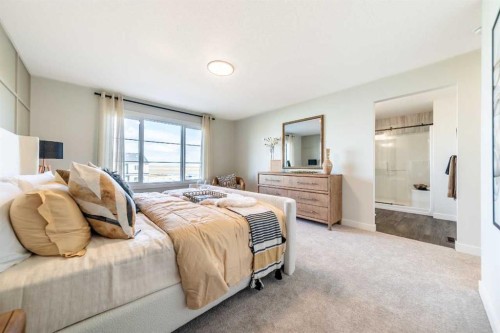 405 Sora Way Se, Calgary, AB - Indoor Photo Showing Bedroom