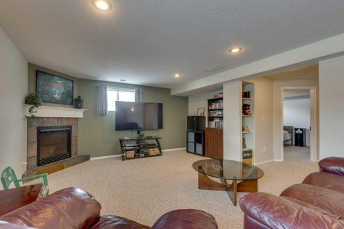 224 Iverson Close, Red Deer, AB - Indoor With Fireplace
