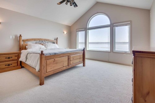 384 Marina Bay Place, Sylvan Lake, AB - Indoor Photo Showing Bedroom