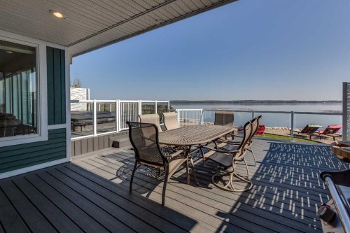 384 Marina Bay Place, Sylvan Lake, AB - Outdoor With Body Of Water With Deck Patio Veranda With Exterior