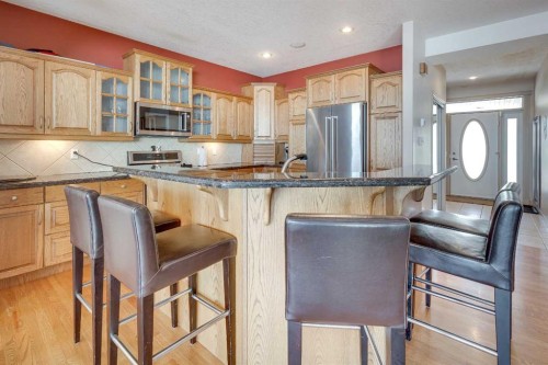 384 Marina Bay Place, Sylvan Lake, AB - Indoor Photo Showing Kitchen With Stainless Steel Kitchen