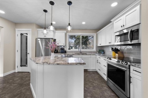 3630 Erickson Drive, Camrose, AB - Indoor Photo Showing Kitchen With Upgraded Kitchen