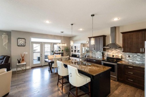 5824 Maple Crescent, Innisfail, AB - Indoor Photo Showing Kitchen With Upgraded Kitchen