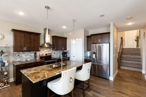 5824 Maple Crescent, Innisfail, AB - Indoor Photo Showing Kitchen With Double Sink With Upgraded Kitchen