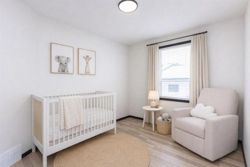 16 Johnson Close, Penhold, AB - Indoor Photo Showing Bedroom