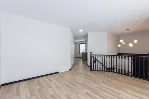 16 Johnson Close, Penhold, AB - Indoor Photo Showing Other Room