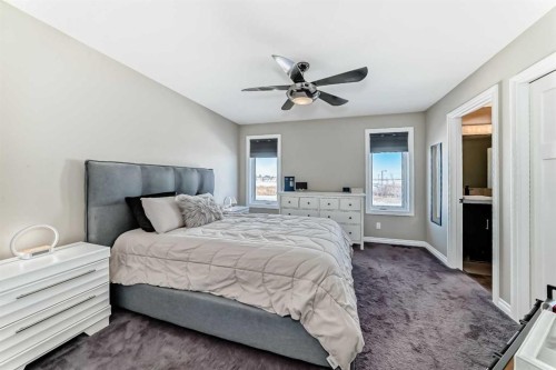 668 Robinson Avenue, Penhold, AB - Indoor Photo Showing Bedroom