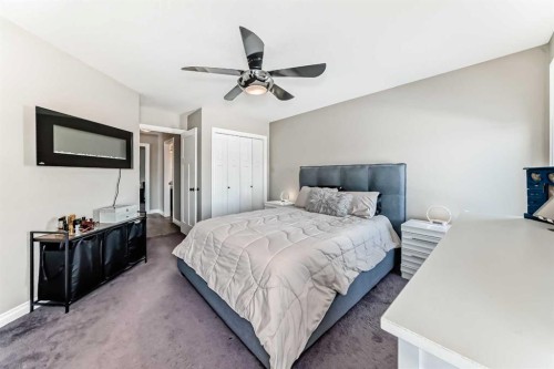 668 Robinson Avenue, Penhold, AB - Indoor Photo Showing Bedroom