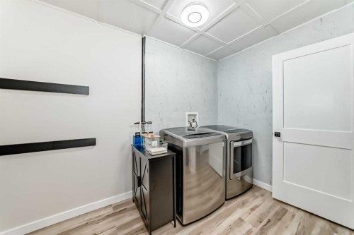 668 Robinson Avenue, Penhold, AB - Indoor Photo Showing Laundry Room