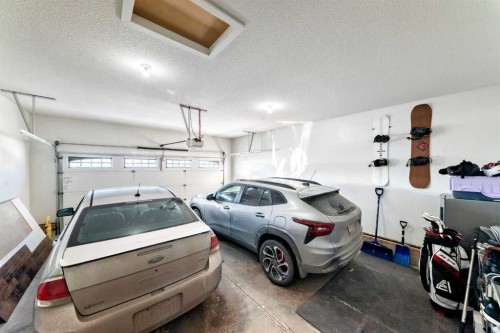 668 Robinson Avenue, Penhold, AB - Indoor Photo Showing Garage
