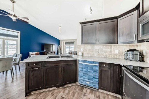 668 Robinson Avenue, Penhold, AB - Indoor Photo Showing Kitchen With Double Sink
