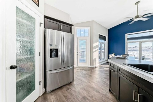668 Robinson Avenue, Penhold, AB - Indoor Photo Showing Kitchen With Stainless Steel Kitchen