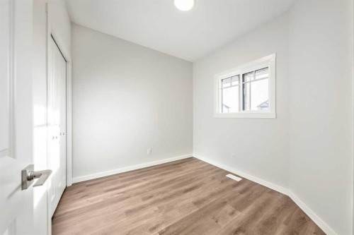 24 Heritage Link, Cochrane, AB - Indoor Photo Showing Other Room
