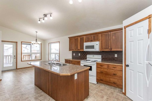 63 Vickers Close, Red Deer, AB - Indoor Photo Showing Kitchen With Double Sink