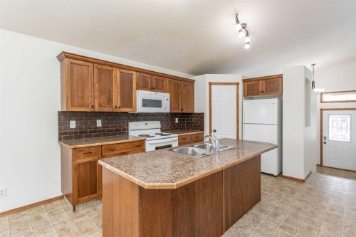 63 Vickers Close, Red Deer, AB - Indoor Photo Showing Kitchen With Double Sink