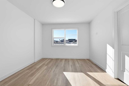 41 Violet Point, Sylvan Lake, AB - Indoor Photo Showing Other Room