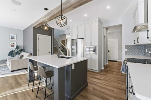 20 Cole Way, Sylvan Lake, AB - Indoor Photo Showing Kitchen With Double Sink With Upgraded Kitchen