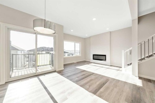 358 Heritage Boulevard, Cochrane, AB - Indoor With Fireplace