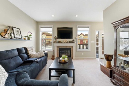 52-45 Ironstone Drive, Red Deer, AB - Indoor Photo Showing Living Room With Fireplace