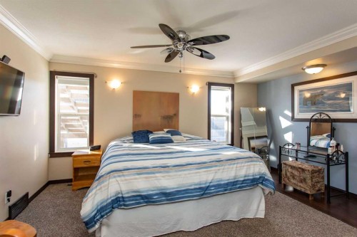 150 Robinson Avenue, Penhold, AB - Indoor Photo Showing Bedroom