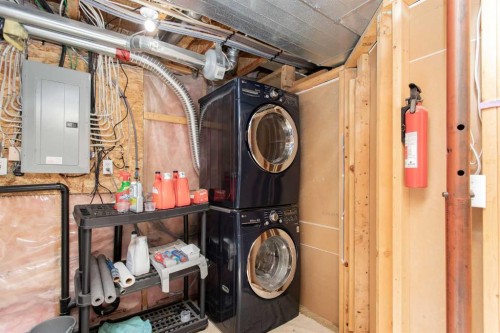 150 Robinson Avenue, Penhold, AB - Indoor Photo Showing Laundry Room