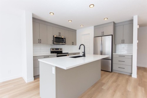 12 Trinity Street, Lacombe, AB - Indoor Photo Showing Kitchen With Stainless Steel Kitchen With Upgraded Kitchen