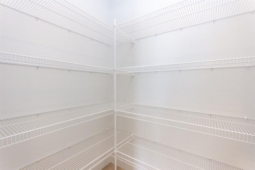 12 Trinity Street, Lacombe, AB - Indoor With Storage