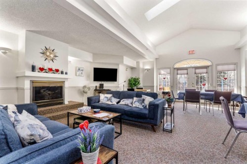 206-45 Gervais Road, St. Albert, AB - Indoor Photo Showing Living Room With Fireplace