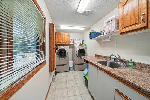 107 Allison Crescent, Red Deer, AB - Indoor Photo Showing Laundry Room