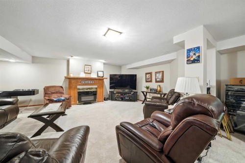 107 Allison Crescent, Red Deer, AB - Indoor Photo Showing Living Room With Fireplace