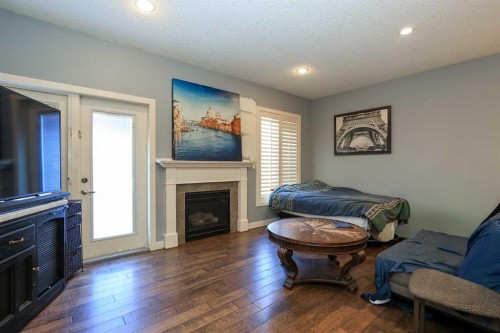 6 Shaw Close, Red Deer, AB - Indoor Photo Showing Living Room With Fireplace