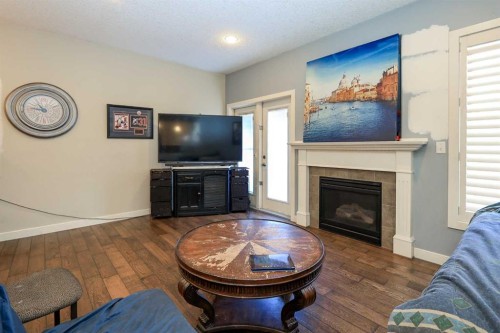 6 Shaw Close, Red Deer, AB - Indoor Photo Showing Living Room With Fireplace