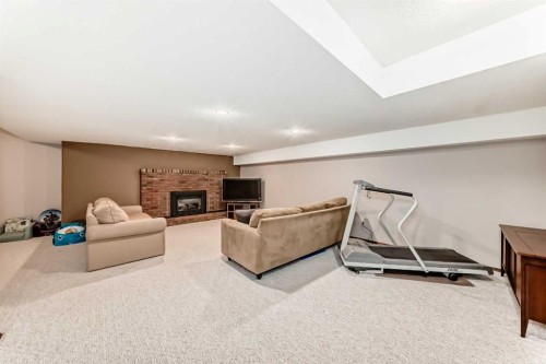 128 Dickenson Crescent, Red Deer, AB - Indoor With Fireplace