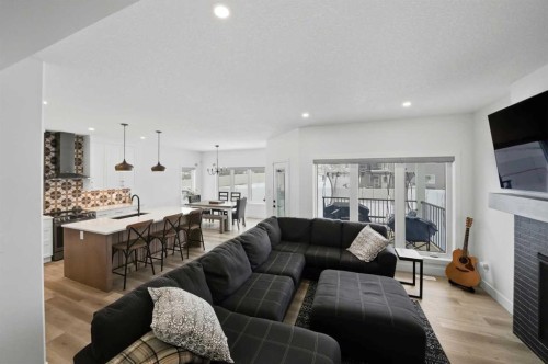 244 Emerald Drive, Red Deer, AB - Indoor Photo Showing Living Room With Fireplace