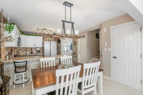 32 Legend Court, Sylvan Lake, AB - Indoor Photo Showing Dining Room