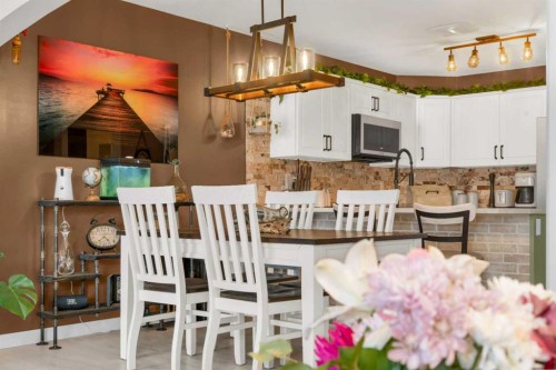 32 Legend Court, Sylvan Lake, AB - Indoor Photo Showing Dining Room