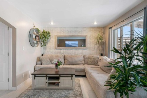 32 Legend Court, Sylvan Lake, AB - Indoor Photo Showing Living Room With Fireplace