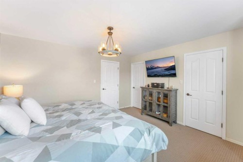 32 Legend Court, Sylvan Lake, AB - Indoor Photo Showing Bedroom