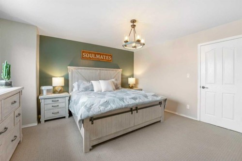 32 Legend Court, Sylvan Lake, AB - Indoor Photo Showing Bedroom