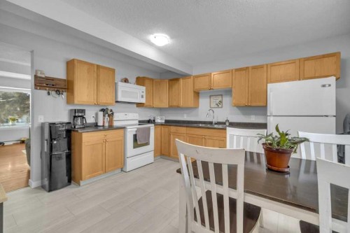 5 Erickson Drive, Red Deer, AB - Indoor Photo Showing Kitchen With Double Sink